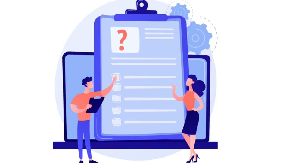 Un gran tablero con preguntas y un hombre y una mujer a los costados discutiendo sobre el tablero